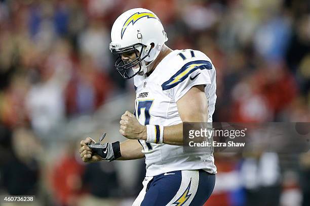 Quarterback Philip Rivers of the San Diego Chargers reacts after throwing a fourth quarter touchdown pass to wide receiver Malcom Floyd against the...