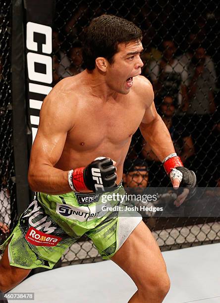 Lyoto Machida of Brazil of Brazil celebrates after his TKO victory over CB Dollaway of the United States in their middleweight fight during the UFC...