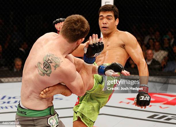 Lyoto Machida of Brazil kicks CB Dollaway of the United States in their middleweight fight during the UFC Fight Night event inside the Ginasio Jose...