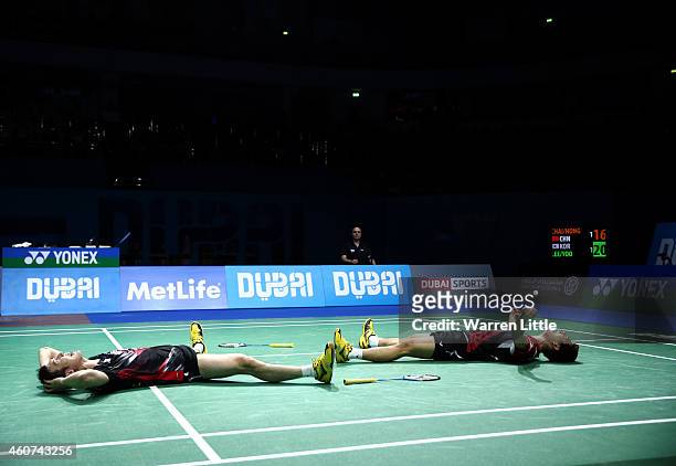 Lee Yong Dae and Yoo Yeon Seong of Korea celebrate beating Chai Biao and Hong Wei of China in the Men's Doubles Finals on day five of the BWF...