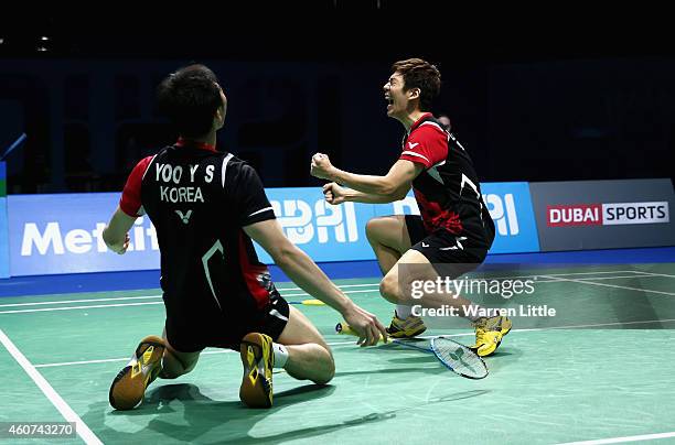 Lee Yong Dae and Yoo Yeon Seong of Korea celebrate beating Chai Biao and Hong Wei of China in the Men's Doubles Finals on day five of the BWF...