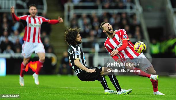 Newcastle player Fabricio Coloccini fouls Steven Fletcher of Sunderland during the Barclays Premier League match between Newcastle United and...