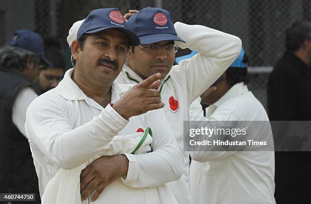 MPs Manoj Tiwari and Parvesh Verma during T20 match played between members of Parliament and journalists to support childrens health at DPS Mathura...