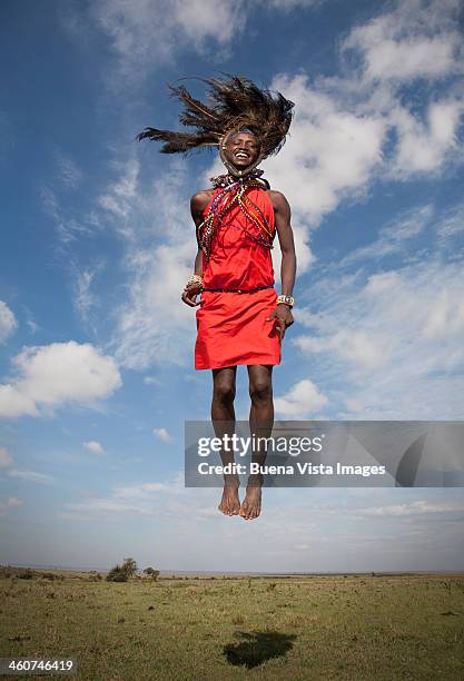 masai warrior jumping in air - masai stock pictures, royalty-free photos & images