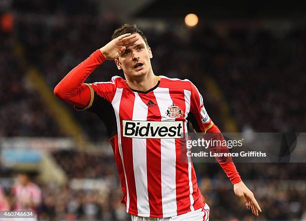 Adam Johnson of Sunderland celebrates scoring the opening goal during the Barclays Premier League match between Newcastle United and Sunderland at St...