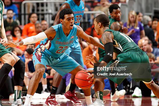 Xavier Rathan-Mayes of the Florida State Seminoles defends against Anthony Collins of the South Florida Bulls during the MetroPCS Orange Bowl...
