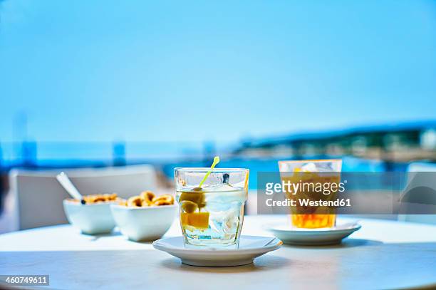 italy, glass of martini bianco drink at street cafe near beach - beach bowl stock pictures, royalty-free photos & images