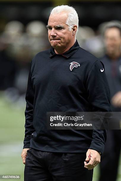 Head coach Mike Smith of the Atlanta Falcons watches action prior to a game against the New Orleans Saints at the Mercedes-Benz Superdome on December...