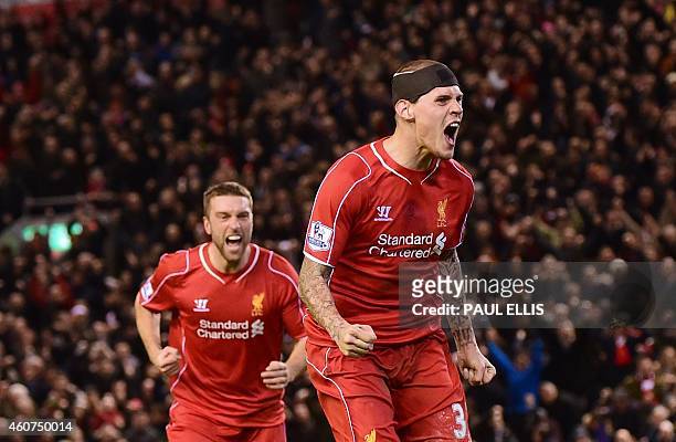 Liverpool's Slovakian defender Martin Skrtel celebrates scoring his team's second equalising goal during the English Premier League football match...