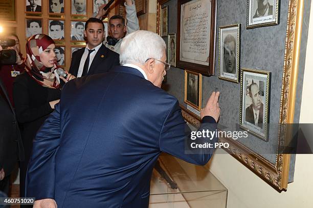 In this handout photo provided by the Palestinian Press Office , Palestinian President, Mahmoud Abbas during a visit to the Algerian Army Museumon...