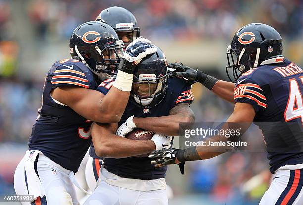 Ryan Mundy of the Chicago Bears celebrates his interception with Jon Bostic, Christian Jones and Brock Vereen of the Chicago Bears during the second...