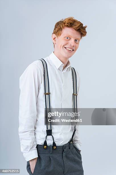 portrait of young man smiling - suspenders stock pictures, royalty-free photos & images