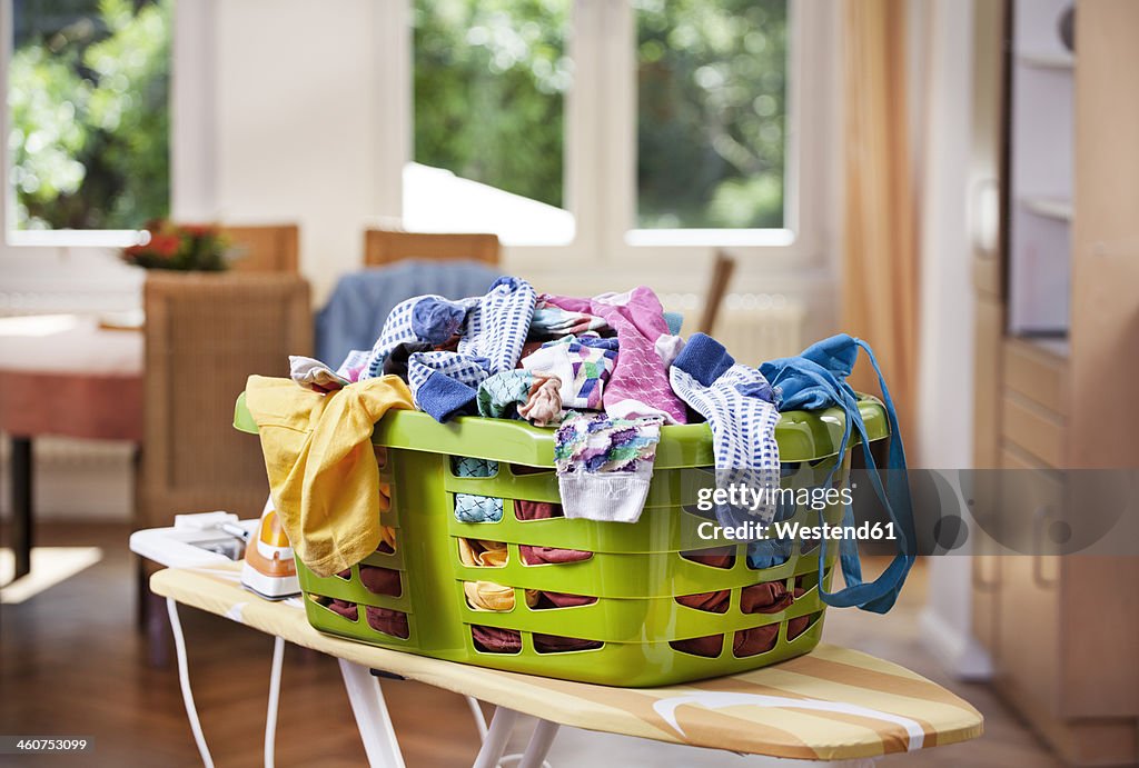 Germany, North Rhine Westphalia, Cologne, Clothes in laundry basket