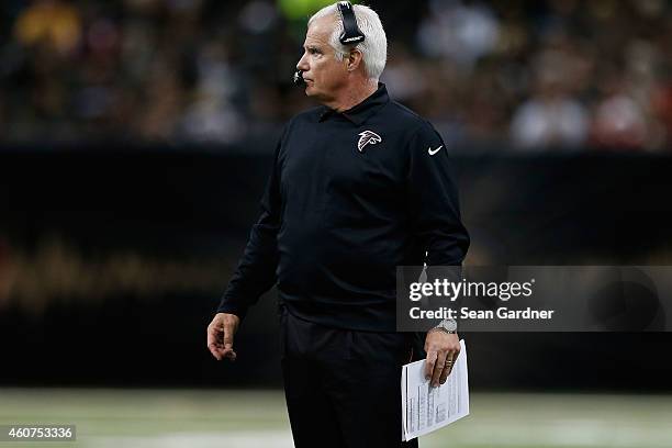 Head coach Mike Smith of the Atlanta Falcons watches action during the fourth quarter of a game against the New Orleans Saints at the Mercedes-Benz...