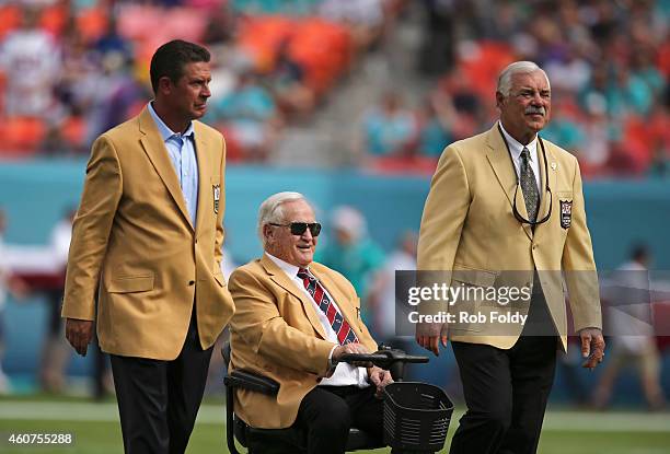 Miami Dolphins greats Dan Marino Don Shula and Larry Csonka are shown on the field before the Dolphins met the Minnesota Vikings in a game at Sun...