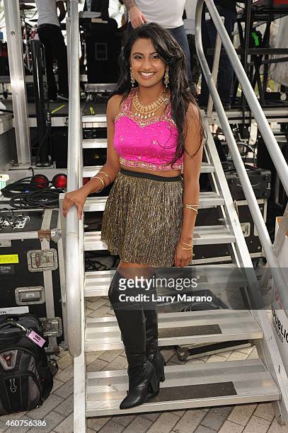 Asha Sing poses at Y100s Jingle Ball Village, Y100s Jingle Ball 2014 official pre-show at BB&T Center on December 21, 2014 in Miami, FL.