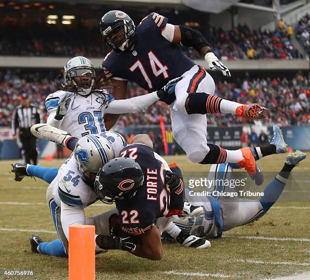 Chicago Bears running back Matt Forte is tackled short of the end zone by Detroit Lions outside linebacker DeAndre Levy during the second quarter on...