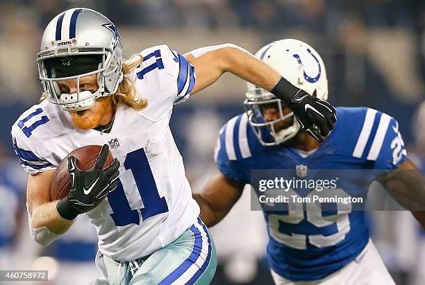 Cole Beasley of the Dallas Cowboys runs for a touchdown after making the catch against the Indianapolis Colts in the first half at AT&T Stadium on...