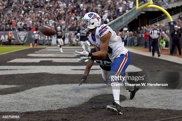 Robert Woods of the Buffalo Bills scores a touchdown in the fourth quarter in front of D.J. Hayden of the Oakland Raiders at O.co Coliseum on...