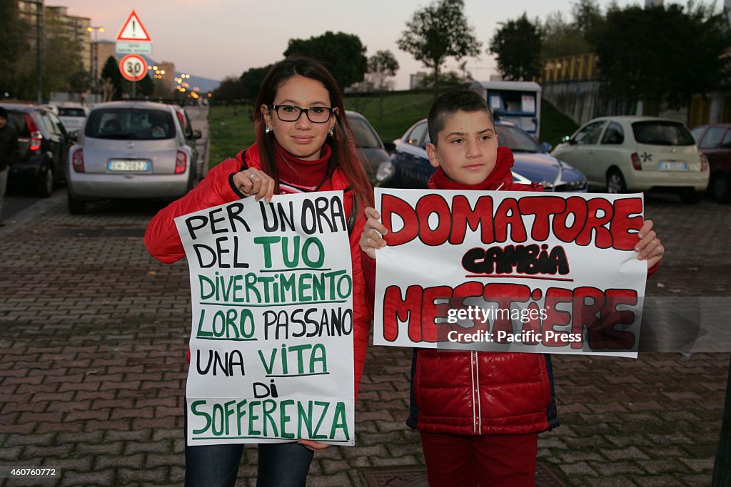 Protesters in the square Giovani Paolo II  with megaphones...