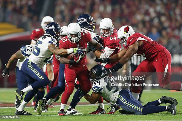 Running back Stepfan Taylor of the Arizona Cardinals rushes the football in the second quarter against the Seattle Seahawks during the NFL game at...