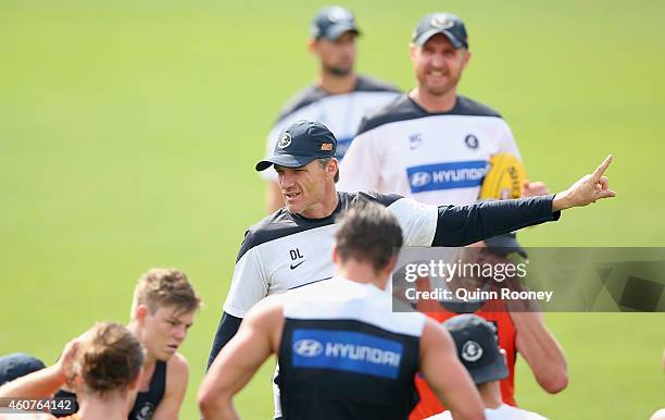 Dean Laidley the assistant coach of the Blues gives instructions during a Carlton Blues AFL Training session at Visy Park on December 22, 2014 in...