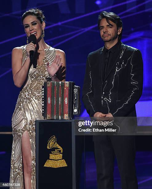 Co-hosts Jacqueline Bracamontes and Eugenio Derbez speak during the 15th annual Latin GRAMMY Awards at the MGM Grand Garden Arena on November 20,...