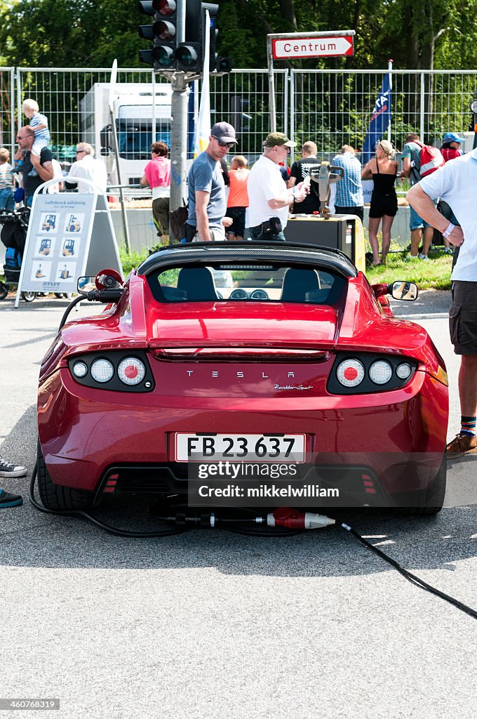 Tesla Roadster Sport being charged outside