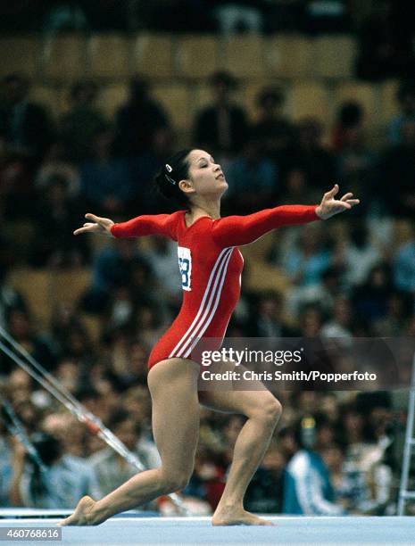 Nellie Kim of the Soviet Union, in action during her gymnastics routine at the Summer Olympic Games in Moscow, circa July 1980. She won gold medals...
