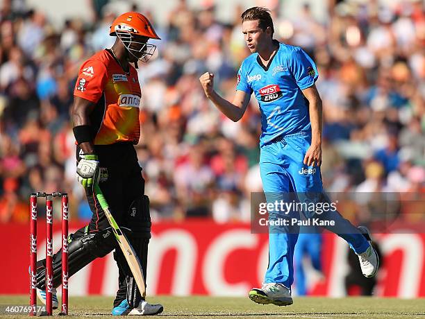 Ben Laughlin of the Strikers celebrates the wicket of Michael Carberry of the Scorchers during the Big Bash League match between the Perth Scorchers...