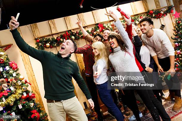 Kirk Norcross and friends on set of the recording of the music video for "Who You Are This Xmas" by Kirk Norcross & Zack Knight on December 18, 2014...