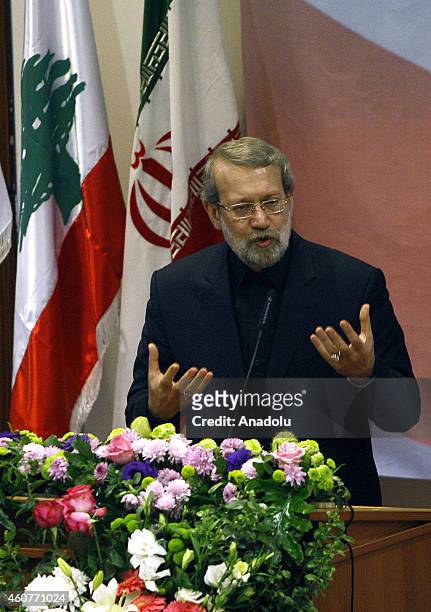 Speaker of Iran's parliament Ali Larijani delivers a speech at Lebanese University in Beirut on December 22,2014.