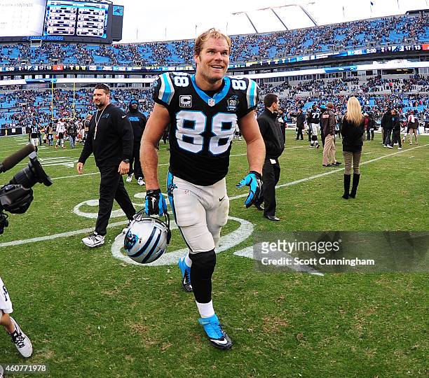 Greg Olsen of the Carolina Panthers celebrates after the game against the Cleveland Browns on December 21, 2014 at Bank of America Stadium in...