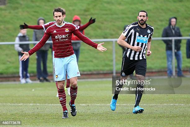 Jonas Gutierrez of Newcastle plays his first game since recovering from cancer with Diego Poyet of West Ham during the Barclays U21 Premier League...