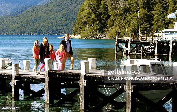 Dutch King Willem-Alexander and Queen Maxima walk with their daughters Amalia , Ariane and Alexia at the port of the Nahuel huapi lake at the Bosque...