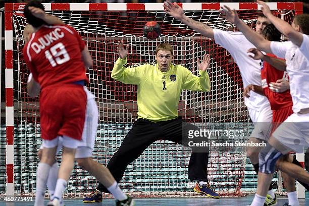 Goalkeeper Nikolay Sorokin of Russia saves the ball during the DHB Four Nations Tournament match between Austria and Russia at Koenig-Pilsner Arena...