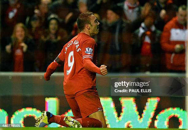 Liverpool's Spanish striker Lago Aspas celebrates scoring a goal during the English FA Cup third round football match between Liverpool and Oldham...