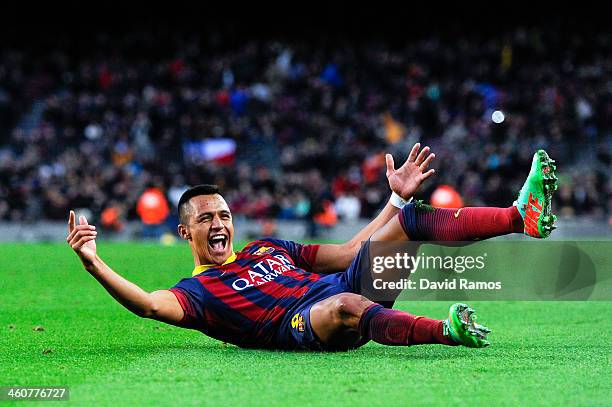 Alexis Sanchez of FC Barcelona celebrates after scoring his team's fourth goal to complete his hat-trick during the La Liga match between FC...