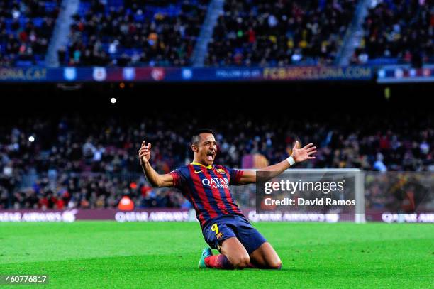 Alexis Sanchez of FC Barcelona celebrates after scoring his team's fourth goal to complete his hat-trick during the La Liga match between FC...