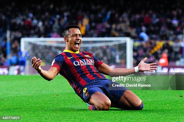 Alexis Sanchez of FC Barcelona celebrates after scoring his team's fourth goal to complete his hat-trick during the La Liga match between FC...