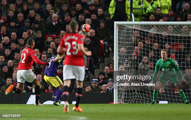 Wayne Routledge of Swansea City scores the opening goal during the FA Cup with Budweiser Third round match between Manchester United and Swansea City...