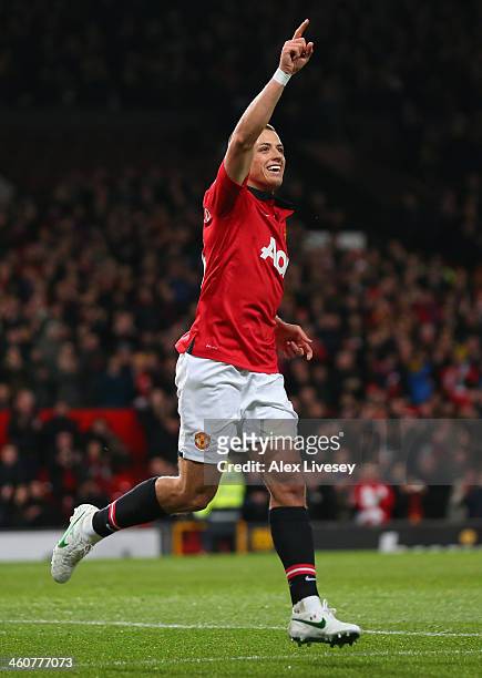 Javier Hernandez of Manchester United celebrates scoring his team's first goal during the FA Cup with Budweiser Third round match between Manchester...