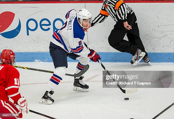 Nick Schmaltz of the USA National Junior Team skates during the third period of NCAA exhibition hockey against the Boston University Terriers at...