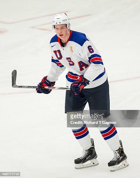 Ryan Collins of the USA National Junior Team skates during the third period of NCAA exhibition hockey against the Boston University Terriers at...