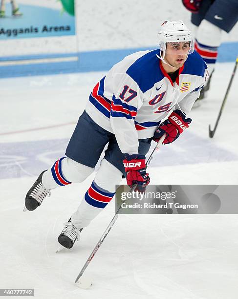 Alex Tuch of the USA National Junior Team warms up prior to NCAA exhibition hockey against the Boston University Terriers at Walter Brown Arena on...