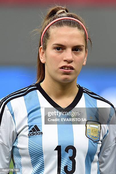 Argentine player Camila Gomez listens to the national anthem before a match of the 2014 Brasilia International Tournament at the Mane Garrincha...