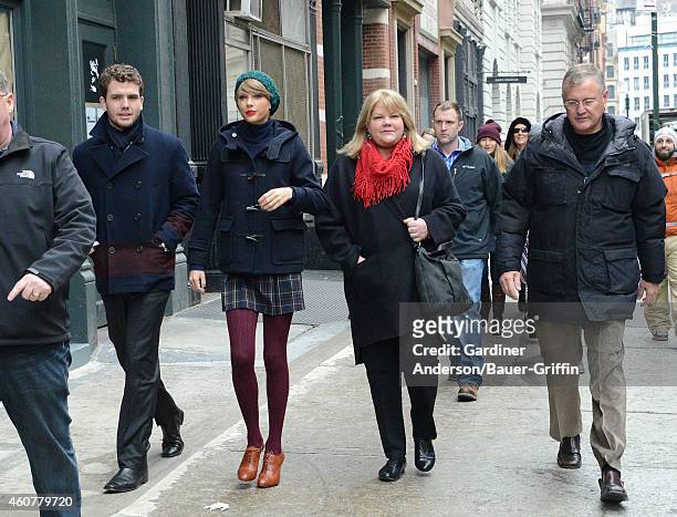 Austin Swift, Taylor Swift, Andrea Finlay and Scott Swift are seen on December 22, 2014 in New York City.