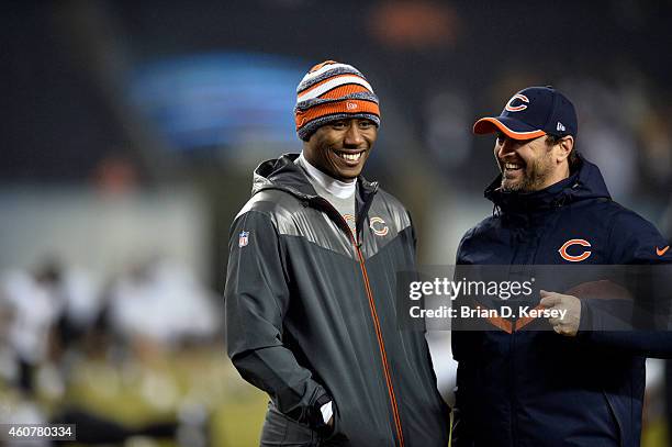 Brandon Marshall of the Chicago Bears talks with wide receiver coach Mike Groh before the game against the New Orleans Saints at Soldier Field on...