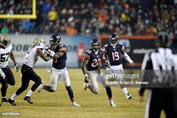 Matt Forte of the Chicago Bears carries the ball during the fourth ...