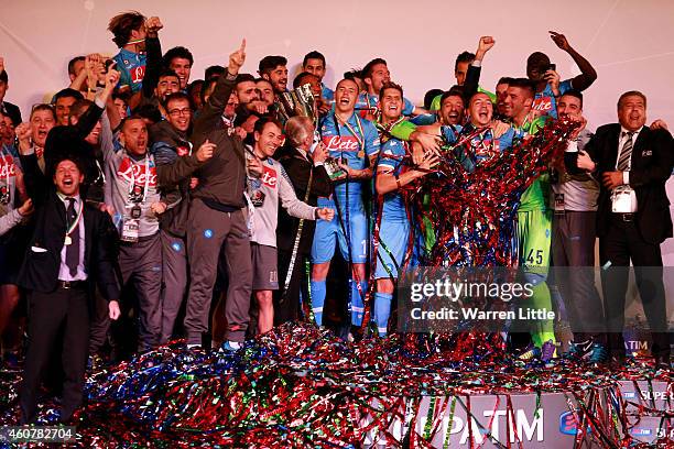 Marek Hamsik, Captain of Napoli raises the trophy after winning the 2014 Italian Super Cup match between Juventus FC v SSC Napoli at the Jassim Bin...